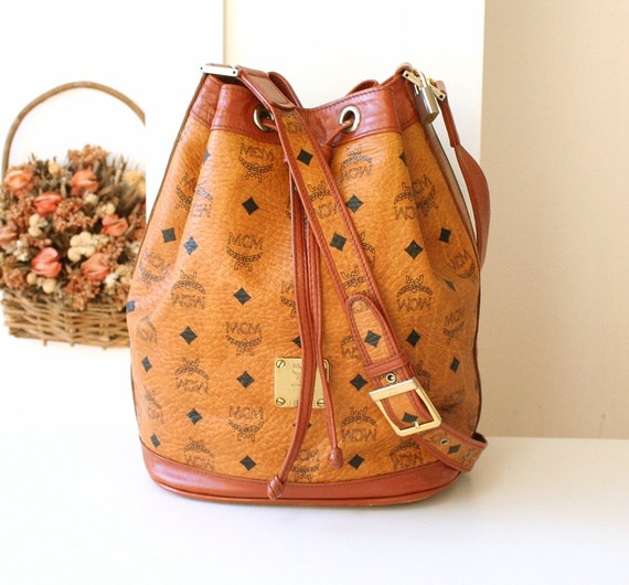 MCM Bag Visetos Cognac Brown Drawstring Canvas Leather by allvin