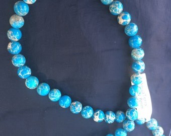 Aqua Terra Jasper; 8mm; 48 beads per strand; 16" strand