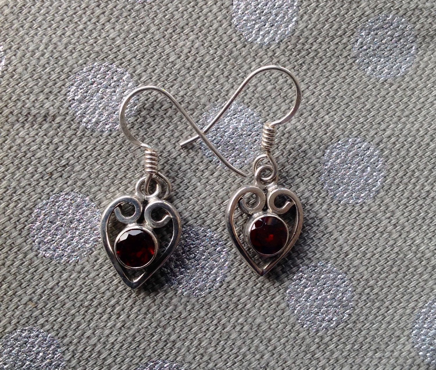 Handmade sterling silver earrings with Garnet gemstone.