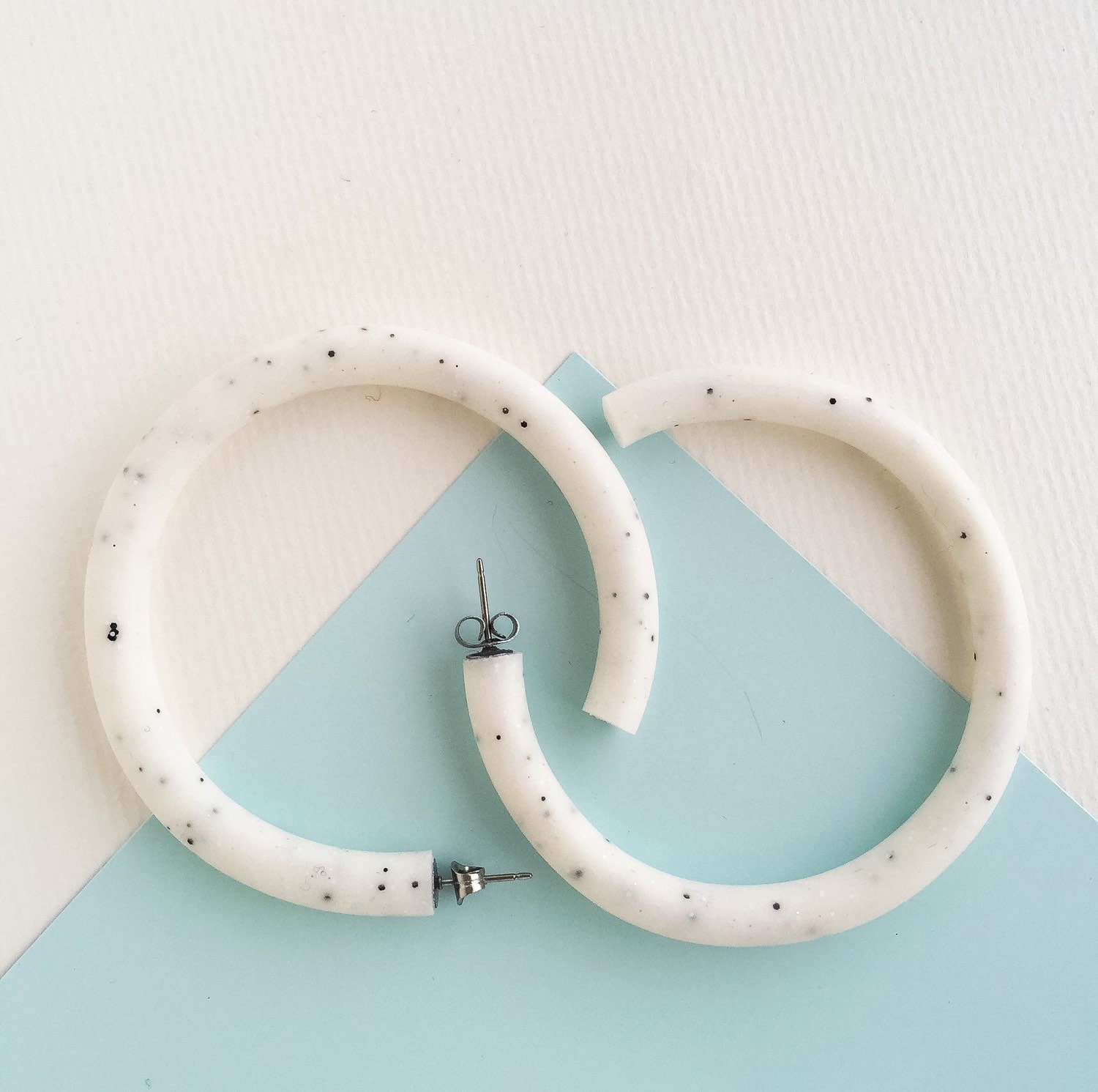 Large Hoop Earrings in a white granite colour.