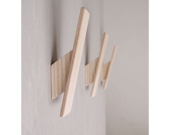 Wooden Wall Hooks for the Modern Hallway or Bathroom. Clean, simple design with hidden fixings and Scandinavian style.