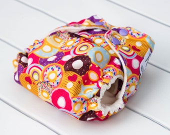 One Size Cloth Diapers. Sprinkled Donut Cloth Diaper. All in One. All In 2. Diaper Cover and Insert. OS Cloth Diaper. Bamboo Velour Insert.