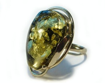 Natural Baltic green amber ring.