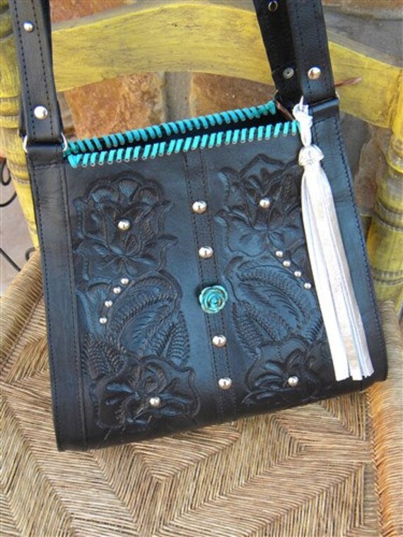 black tooled leather bag