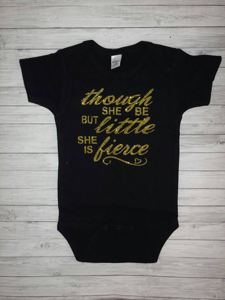 Gold glitter black onesie for a baby girl. Though she be
