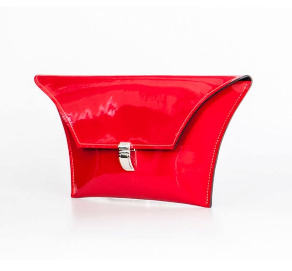 red and white clutch bag