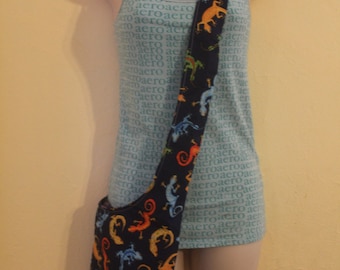 Blue multicolored gecko/flower reversible crossbody hobo/sling bag
