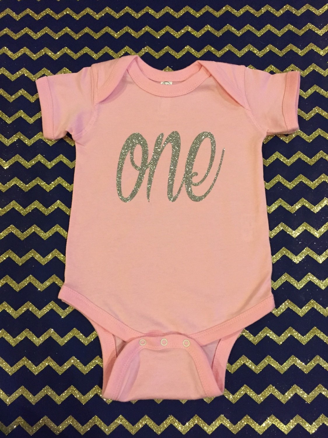 ONE first birthday onesie silver glitter heart bottom