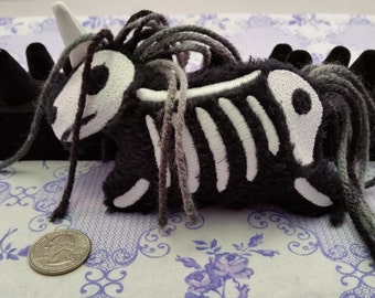 skeleton unicorn plush