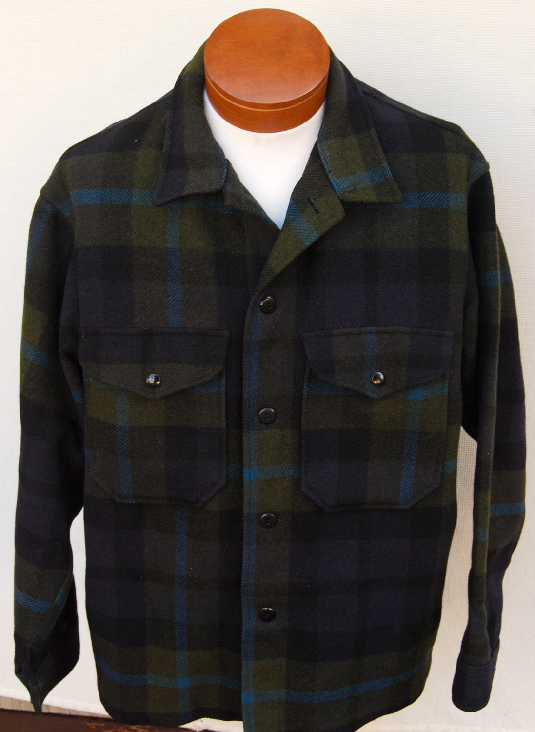 green and black wool hunting jacket