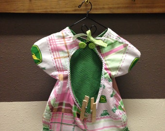 Clothes pin bag made vintage style to look like a cute little dress. Has John Deere fabric. Would look nice in any home sweet home.