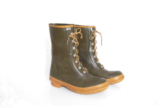 green rubber boots with yellow laces