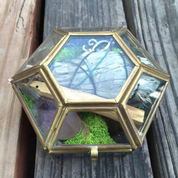 spell box/alter kit inside a beautiful vintage glass
