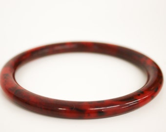 Bracelets in red – 1960s years