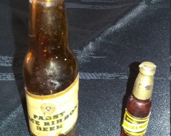 Vintage souvenir beer bottles