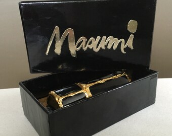 Masumi by Coty Inner Beauty purser .12 oz boxed full black rollerball applicator purse sized 1960's display use lovely metallic brutallist