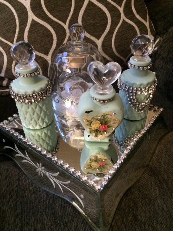 Stunning vanity rhinestone bottles and a mirror tray