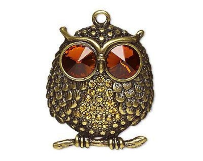 Large owl pendant, rhinestone & antiqued brass, orange rhinestone eyes, golden yellow rhinestone chest, brass feathers and branch, 38x33mm