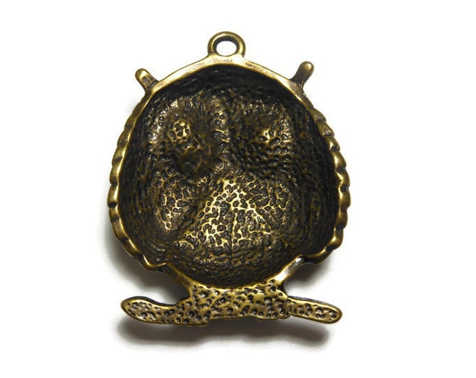 Large owl pendant, rhinestone & antiqued brass, orange rhinestone eyes, golden yellow rhinestone chest, brass feathers and branch, 38x33mm