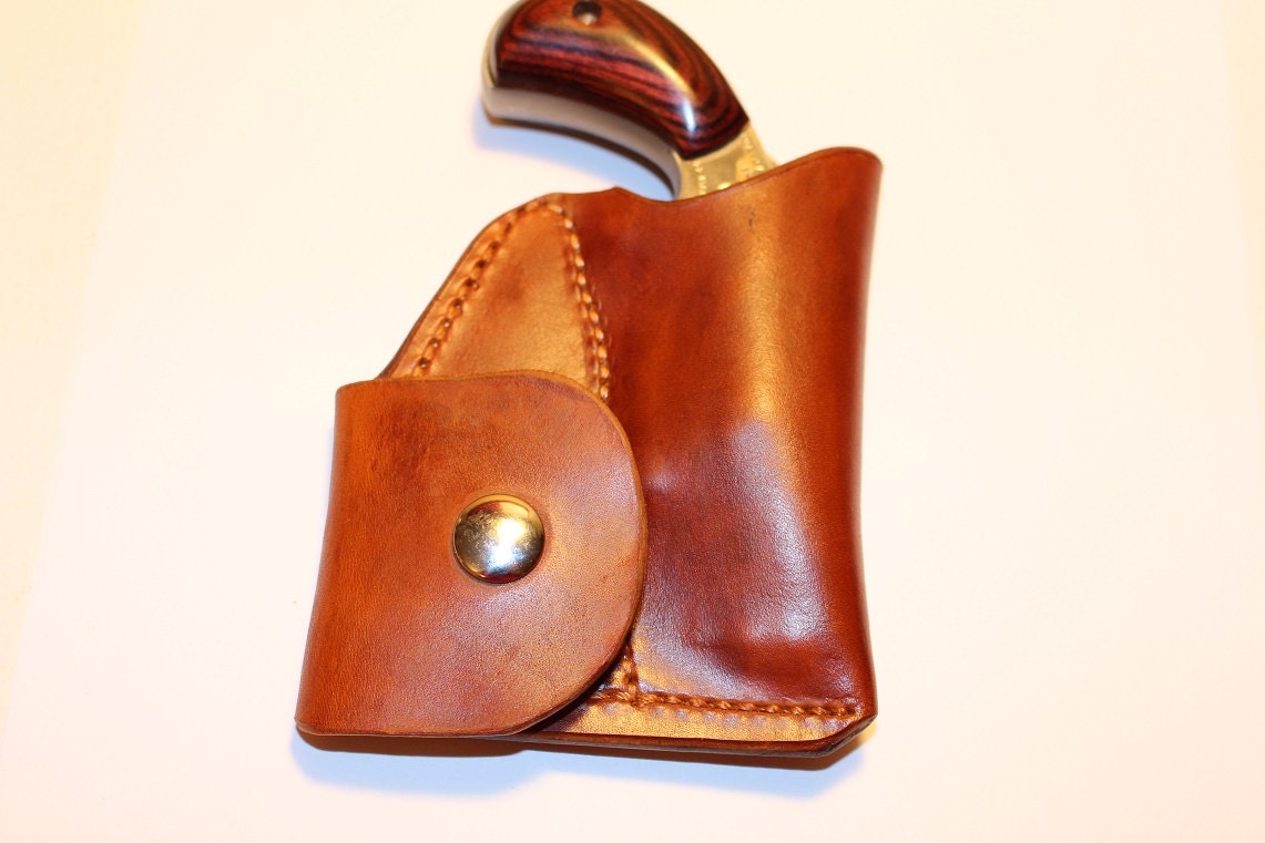 Pocket holster with ammo pouch for NAA 22 Mag Sidewinder