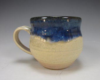 Handmade, stoneware, coffee mug. Blue and creamy white, ceramic tea cup