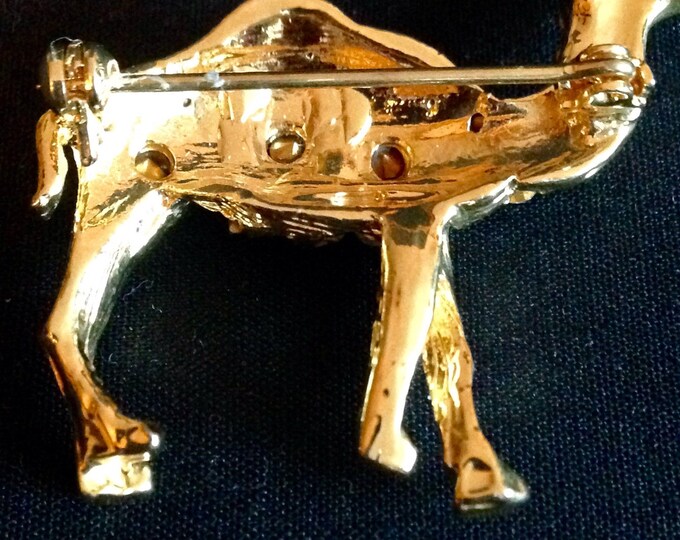 Storewide 25% Off SALE Vintage Gold Tone Rhinestone Encrusted Desert Camel Designer Brooch Pin Featuring Single Emerald Rhinestone Eye Accen