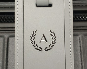 One of our favorite monogrammed leather luggage tag, Boldly embossed and personalized with first initial and last name. Simply stunning.