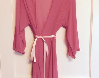 1980s sheer pink wrap nylon robe with ruffles on cuffs