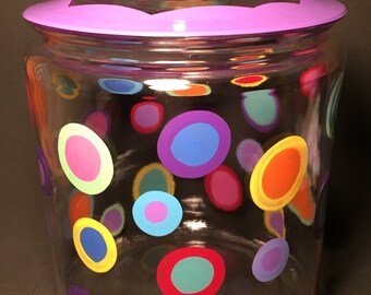 cookie or dog treat jar with plum edge and colorful polka dots