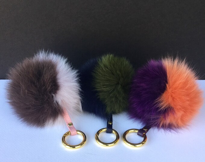 Fox Fur Pom Pom keychain luxury bag charm pendant keychain keyring in duo deep black and white color tones strap and gold buckle