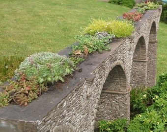 A hand cast concrete model of the Moorswater viaduct