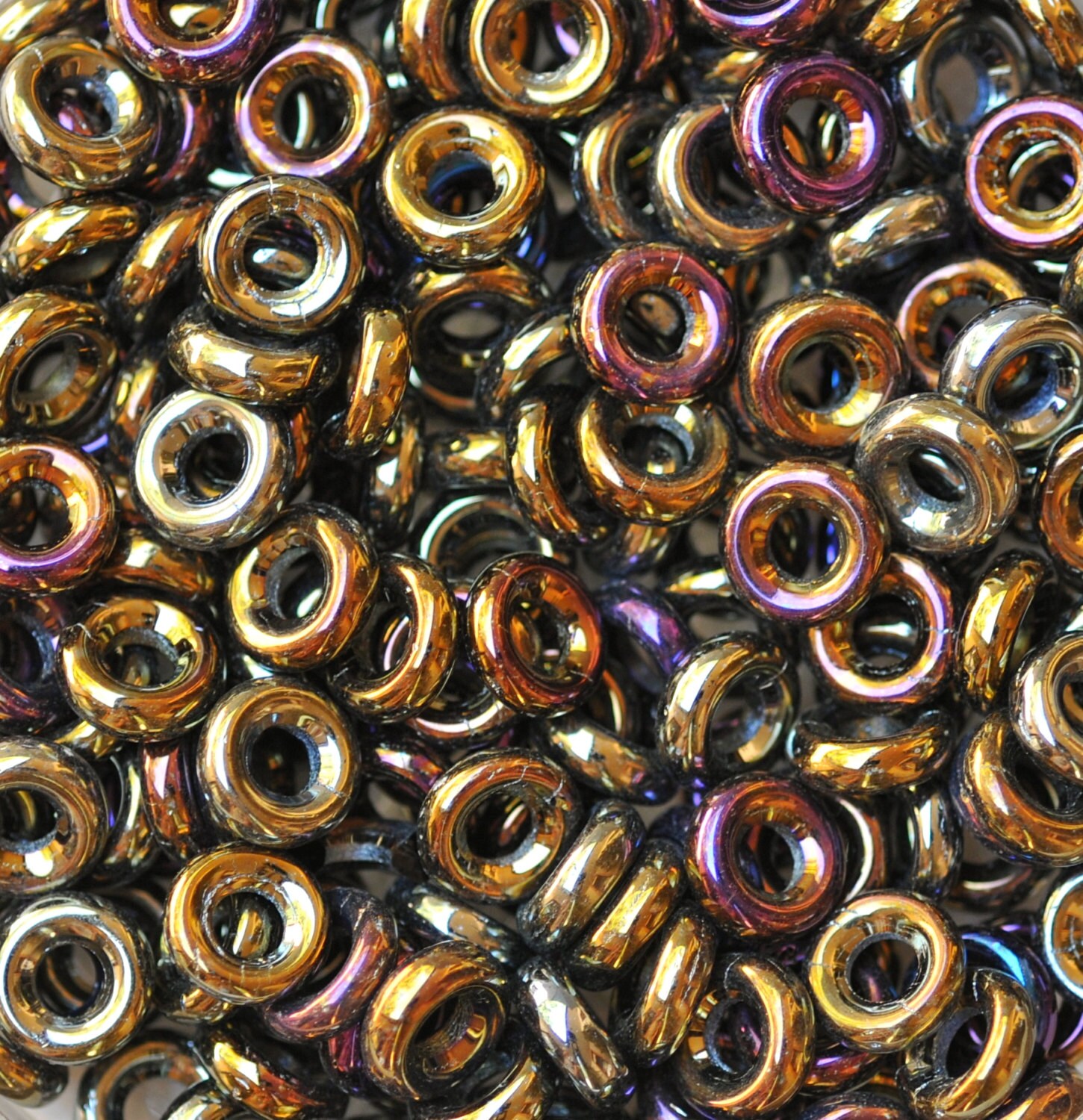 thumbnail image 2 of 50 Czech Glass Donut Beads 8x2.5mm – Iris Blue, Pressed Glossy Finish 2 of 6