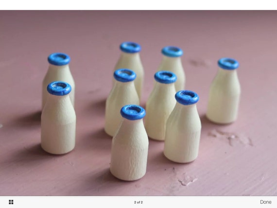 Miniature milk bottles with blue painted lids dollhouse supplies from 3Cheekyboys on Etsy Studio
