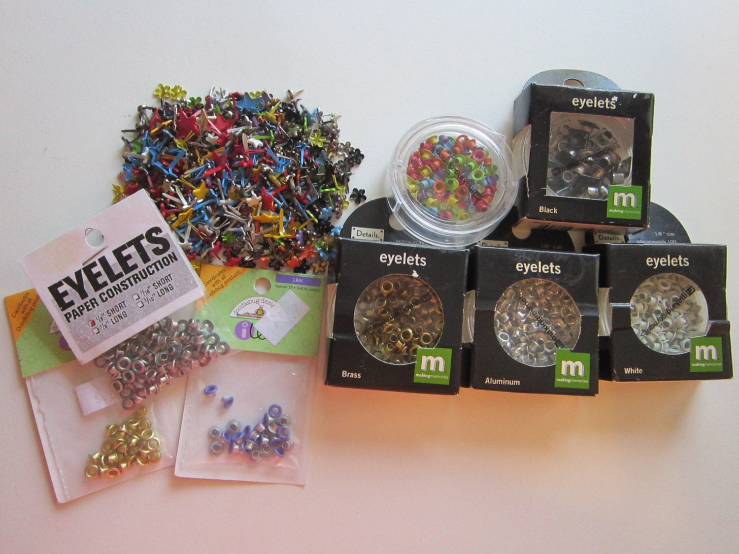 mini eyelets and brads for scrapbooking Making Memories and