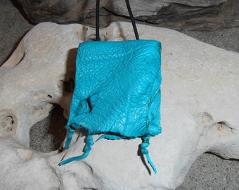 Mermaid...This Wisdom Pouch is made out of Turquoise colored Deerskin leather with a shimmery Turquoise Fish hide leather accent.