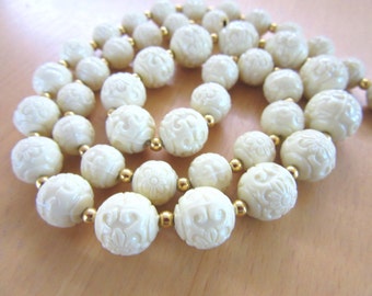 Trifari vintage off white cream colored carved flower graduated size beaded 20" necklace with goldtone bead spacers - Free U.S. Shipping