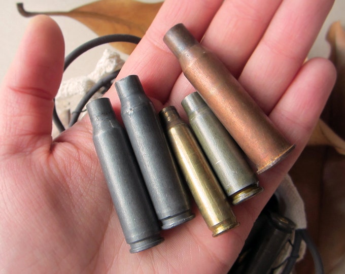 34 bullet shells of different color and size. For jewelry making and art & craft projects.