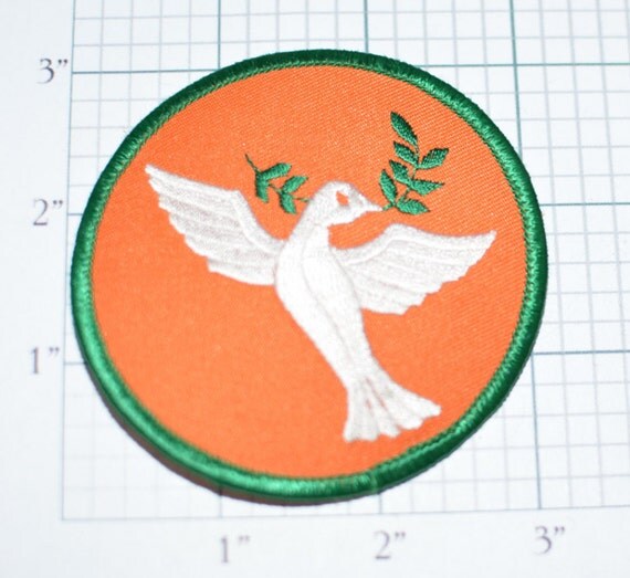 Dove Holding Olive Branch Peace Orange Background Iron On