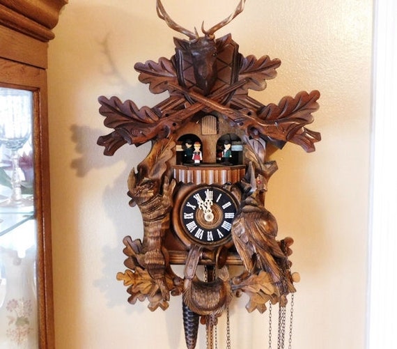 Black Forest Cuckoo Clock Vintage Deer Hunter Hunting Rifles Ammunition Bag Horn Animals Rabbit Pheasant Musical Carousel Dancers Thorens