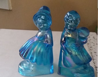 1970's Wheatonware Blue Iridescent Carnival Glass Boy and Girl Bookends. Wheaton Boy and Girl Bookends.
