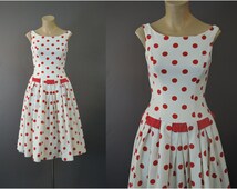 red and white polka dot robe