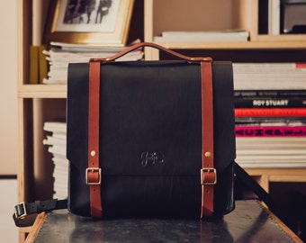 Design by George • • Brown and black leather satchel
