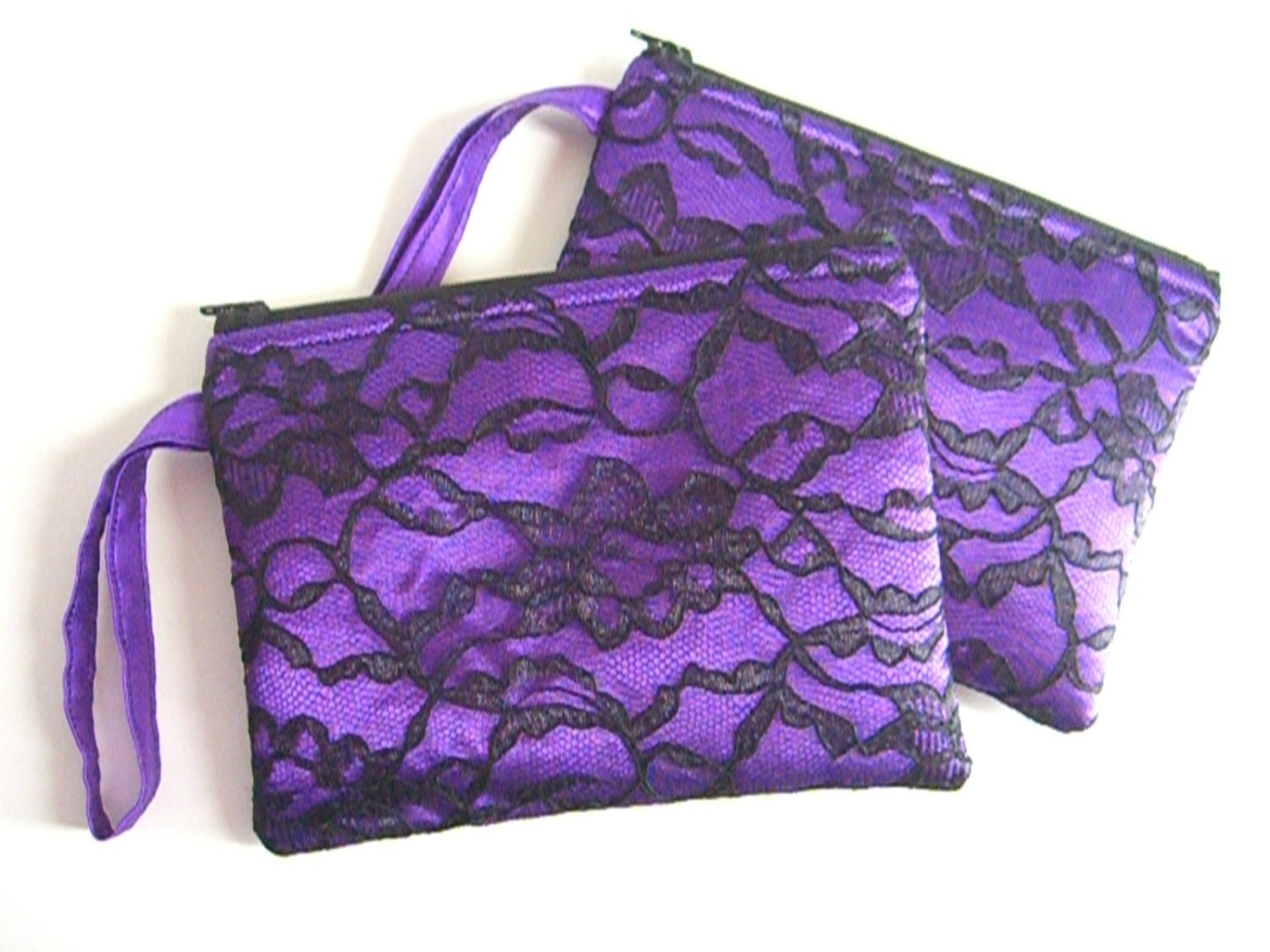 black and purple clutch bag