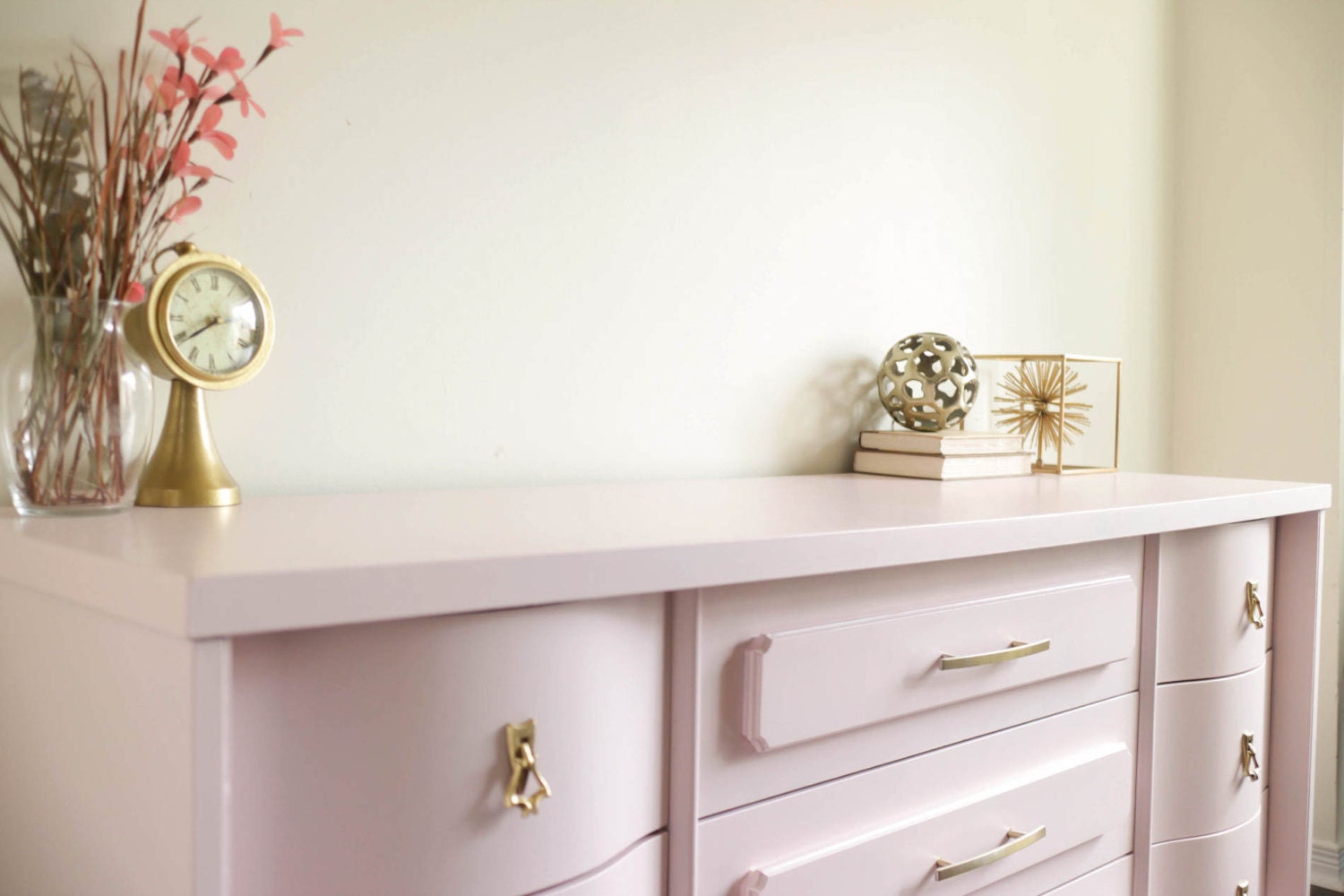 Midcentury modern blush pink dresser with gold by restauredesigns