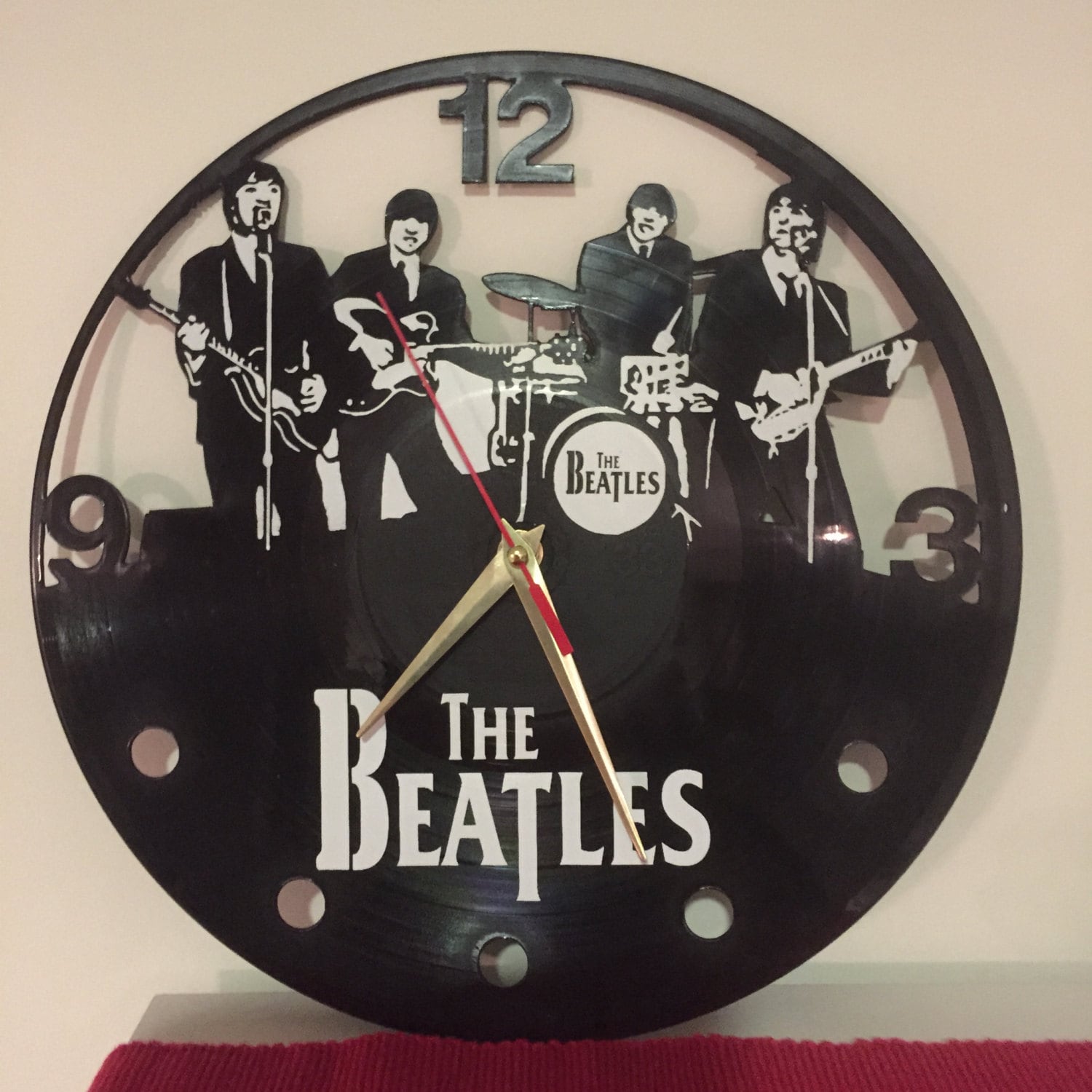 The Beatles vinyl record wall clock upcycled from an