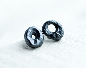tiny bizarre calligraphy circle post earrings, raw textured black oxidized sterling silver small minimalist circular stud earrings