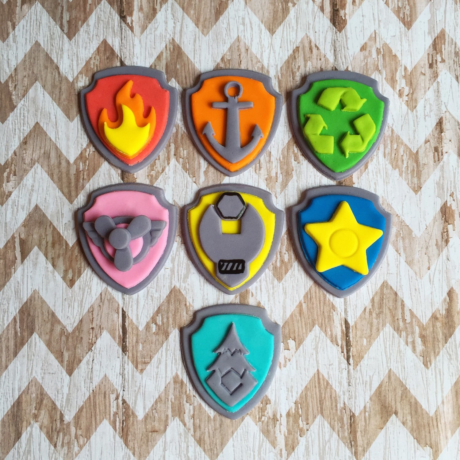Fondant Paw patrol shield toppers by SweetCakeArts on Etsy