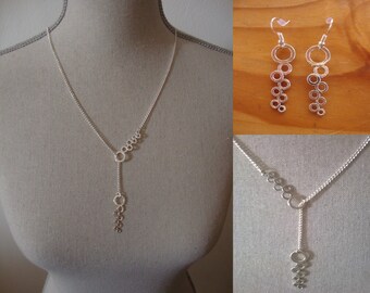 Ornament made hand "Glamour cluster" Silver (necklace and earrings)