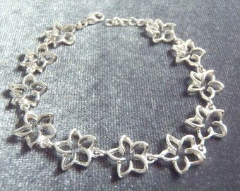 Sterling Silver Cutout Plumeria Flower Bracelet RB2