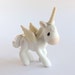 precious moments unicorn figurines